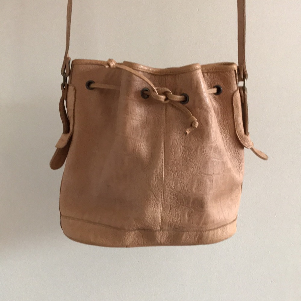 Vintage leather drawstring bucket bag.